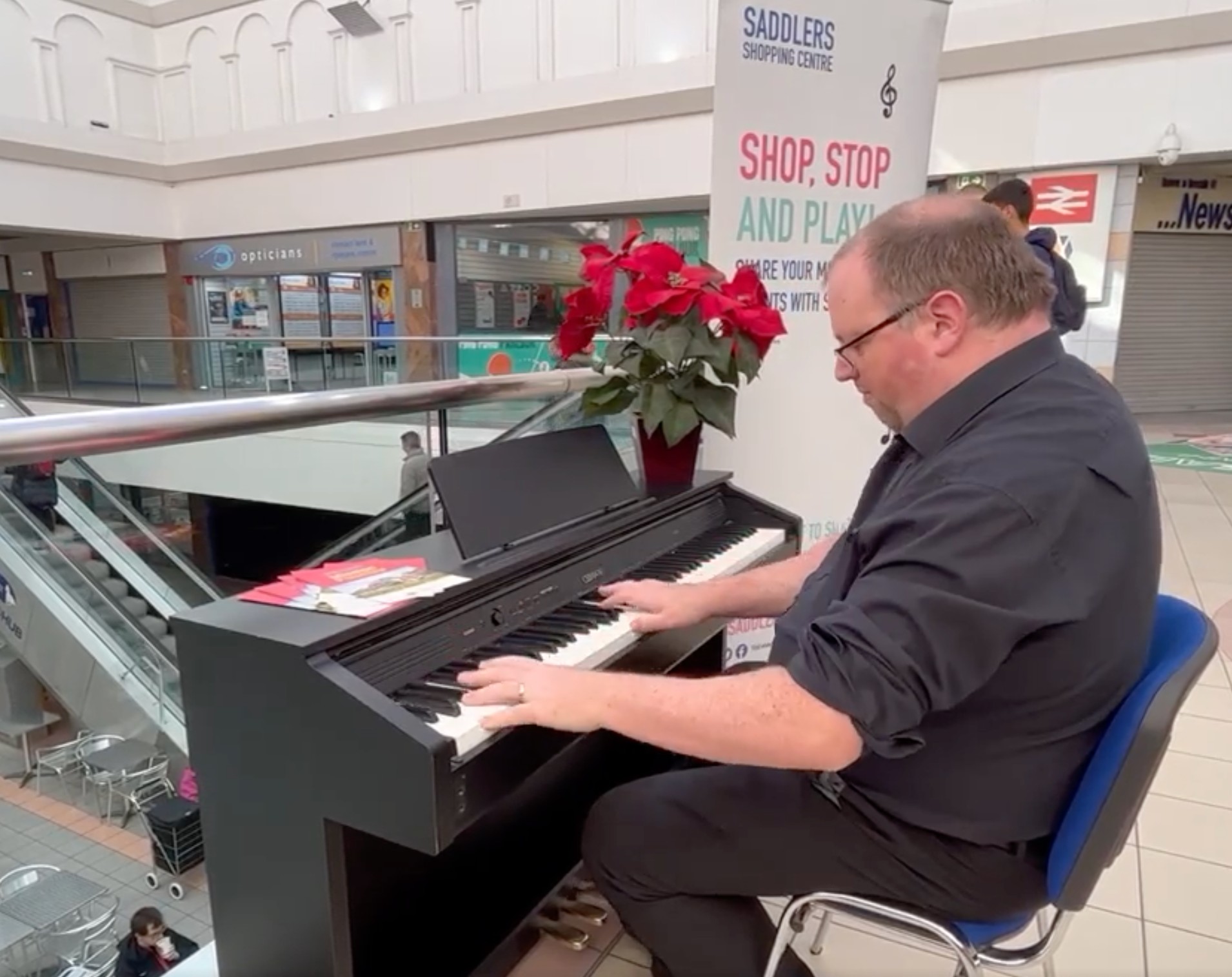 Andrew Clayton playing the public piano in The Saddler's Centre