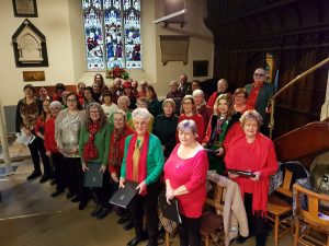 St Matthew's Church Choir in their uniform of Red Gold or Green.